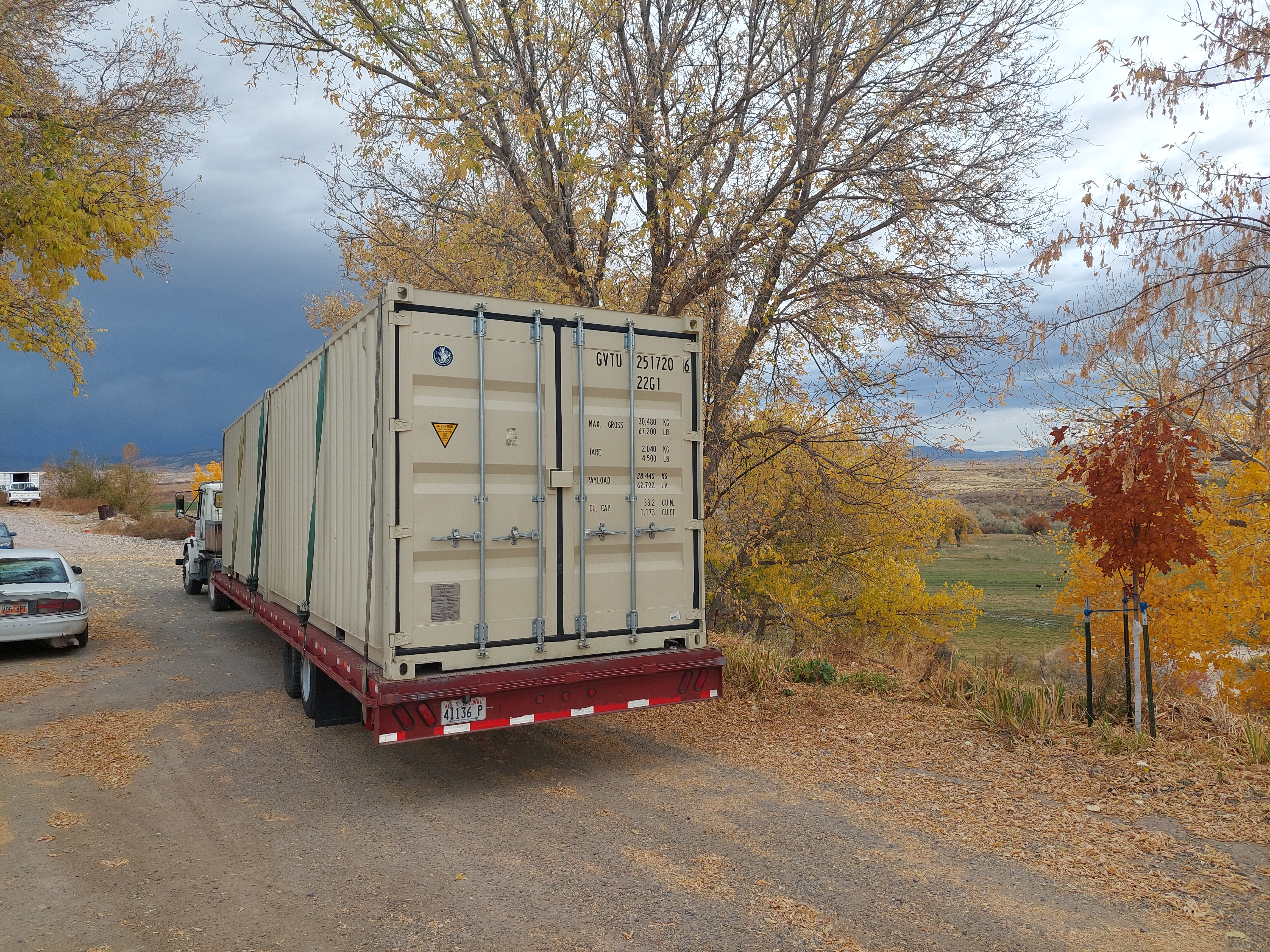 Shipping container delivery truck arriving at Fort Knox Self Storage